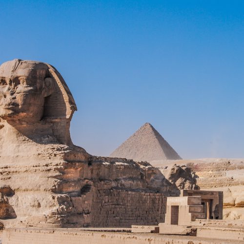 The Great Sphinx with the Pyramids of Giza behind it The Great Sphinx with the Pyramids of Giza behind it