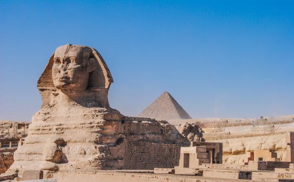 The Great Sphinx with the Pyramids of Giza behind it The Great Sphinx with the Pyramids of Giza behind it